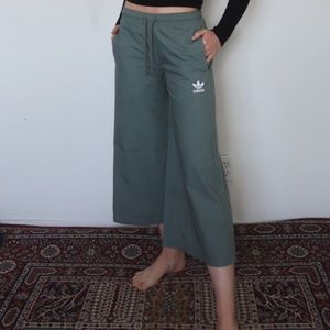 Sage green adidas cropped wide leg active pants